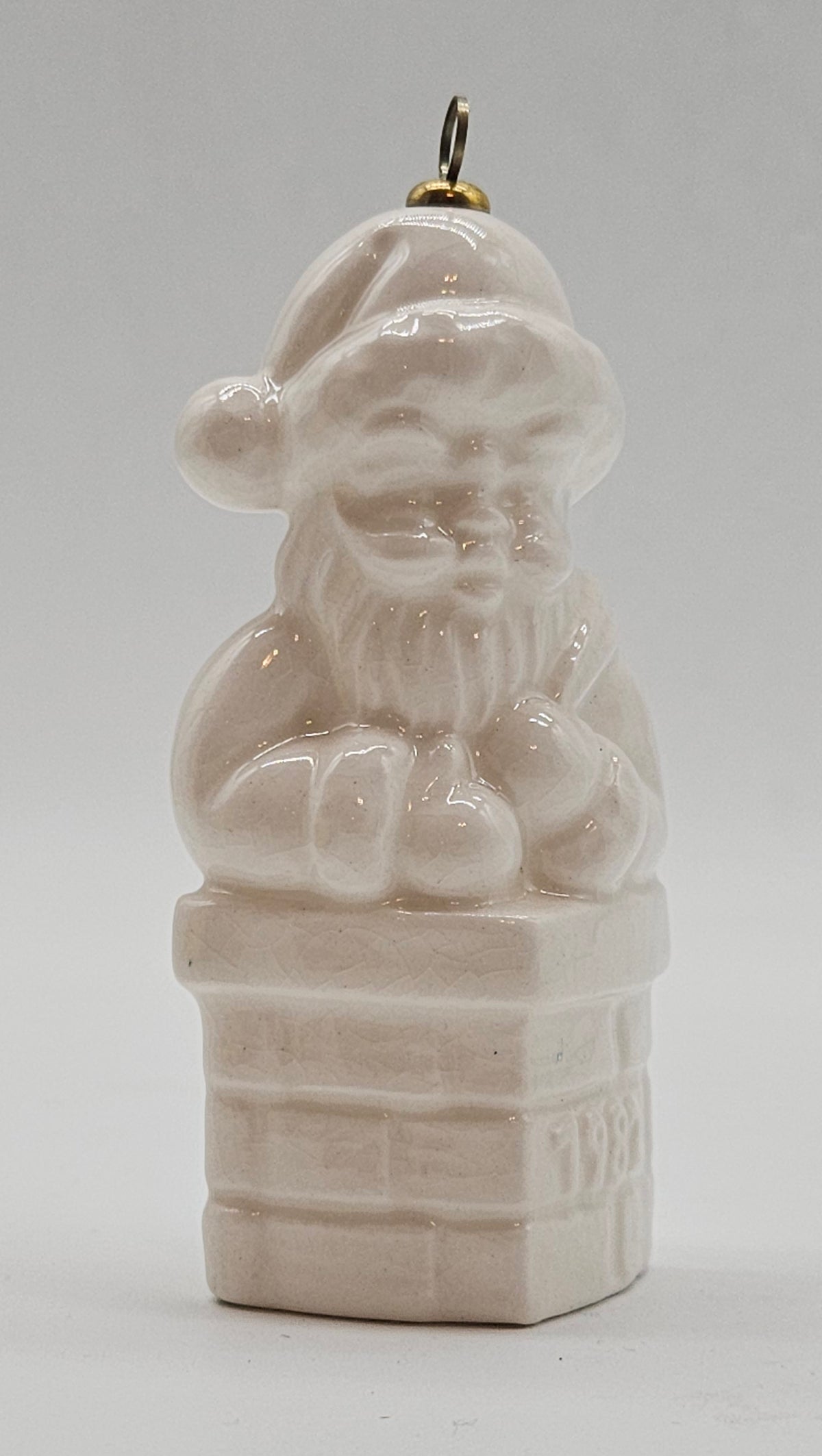Goebel – “Annual Santa in Chimney Fifth Edition White” — ornament view
