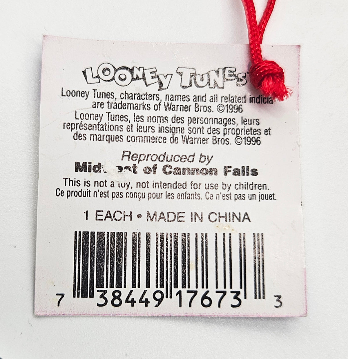 Midwest – “Midwest of Cannon Falls Daffy Duck Hugging Presents” – Damaged — ornament view