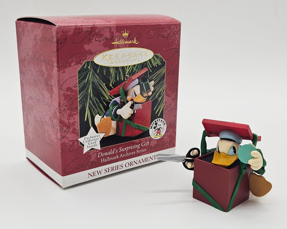 1997 Hallmark Keepsake Donald’s Surprising Gift (QXD4025) — with box and product