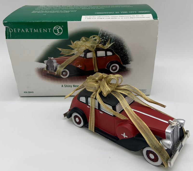 Dept 56- Christmas in the City "A Shiny New Christmas Present"