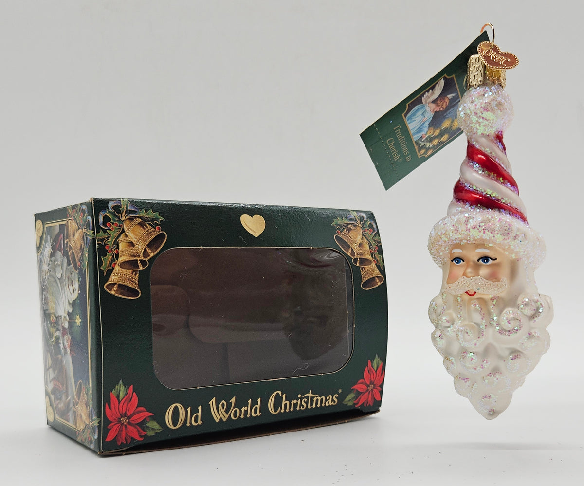 Old World Christmas Peppermint Twist Santa ornament #40269 – ornament alongside photographed packaging