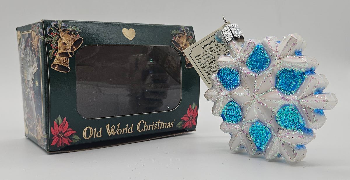 Old World Christmas Snowflake – Version 03 ornament #36076 – ornament alongside photographed packaging