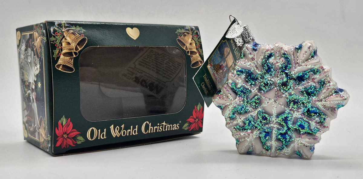 Old World Christmas Snowflake – Version 04 ornament #36076 – ornament alongside photographed packaging
