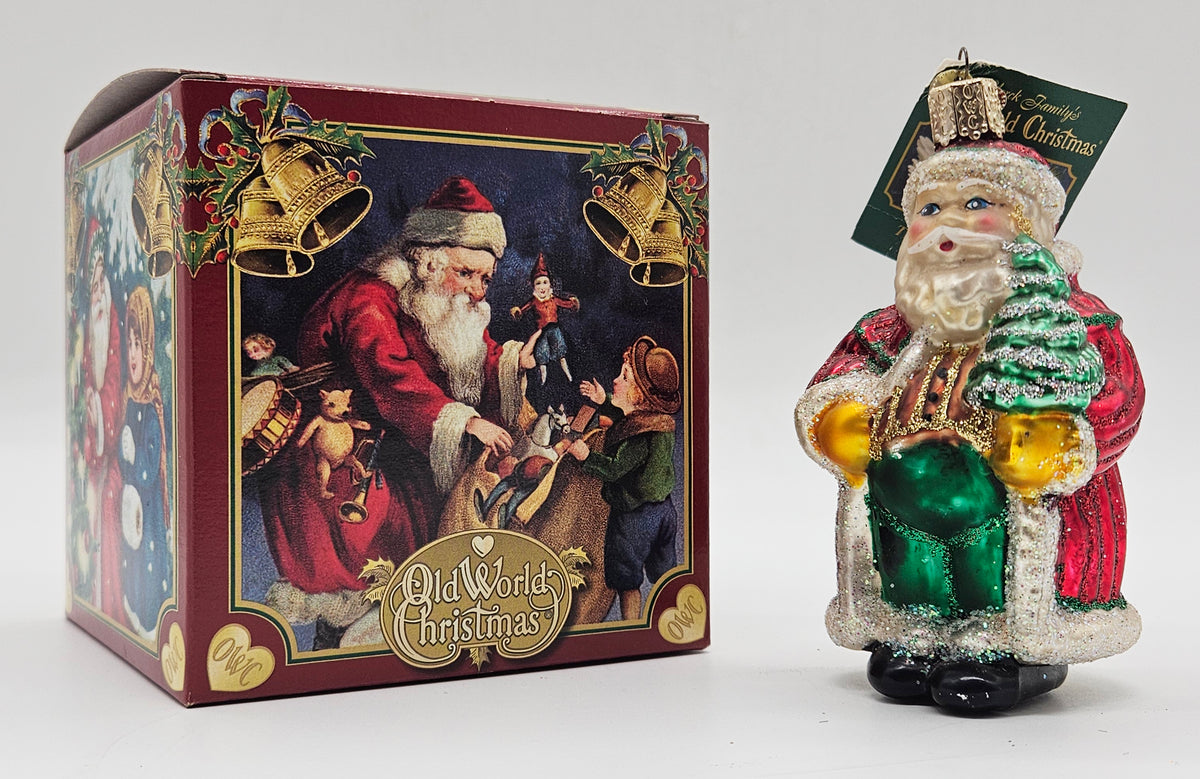 Old World Christmas Striped Father Christmas ornament #40014 – ornament alongside photographed packaging