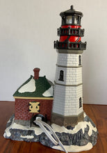 Load image into Gallery viewer, Department 56 Snow Village Christmas Cove Lighthouse back