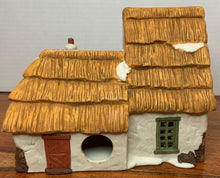 Load image into Gallery viewer, Department 56 The Cottage of Bob Cratchit and Tiny Tim back