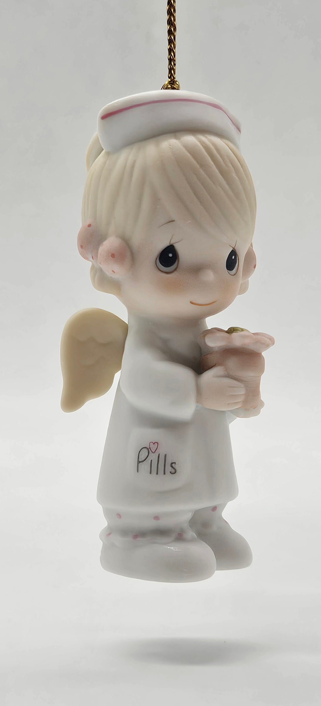 1986 Angel of Mercy 102407 — ornament close-up