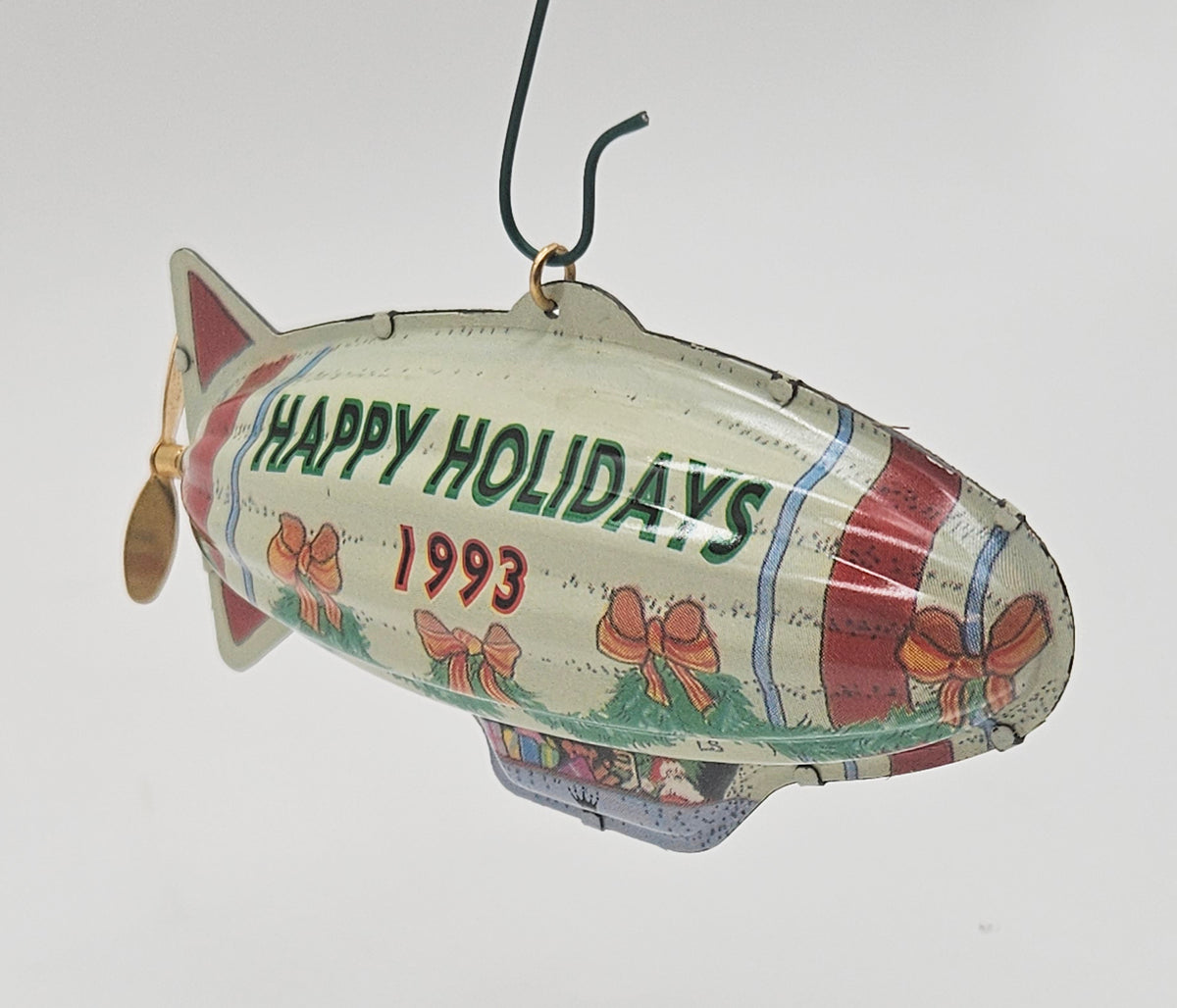 Hallmark Keepsake – “Holiday Fliers Tin Blimp” — ornament view