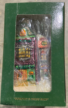 Load image into Gallery viewer, Dept 56- Christmas in the City "Dorothy's Dress Shop" Glass ornament
