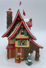 Load image into Gallery viewer, Department 56- North Pole Series &quot;Reindeer Flying Feed Store&quot;
