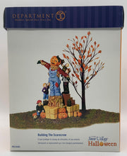 Load image into Gallery viewer, Department 56- Snow Village Halloween "Building the Scarecrow" 
