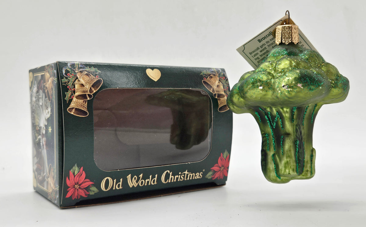Old World Christmas Broccoli ornament #28088 – ornament alongside photographed packaging