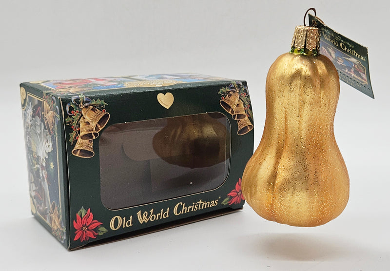 Old World Christmas Butternut Squash ornament #28091 – ornament alongside photographed packaging