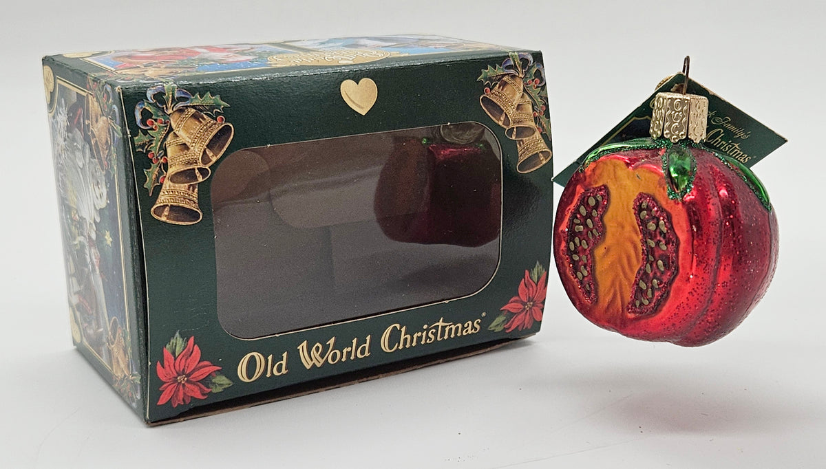 Old World Christmas Garden Tomato ornament #28081 – ornament alongside photographed packaging