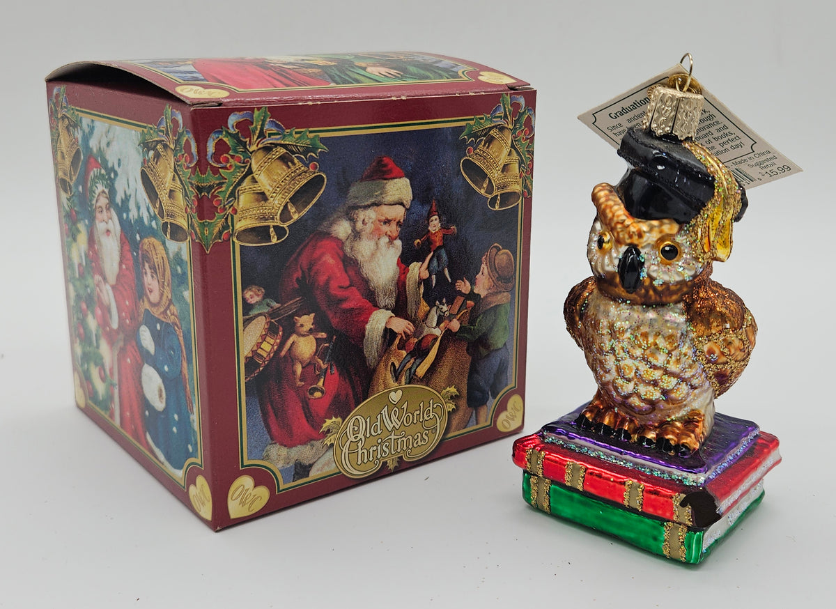 Old World Christmas Graduation Owl ornament #16051 – ornament alongside photographed packaging