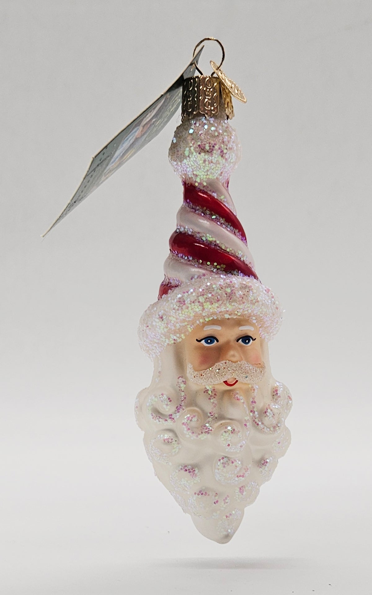 Old World Christmas Peppermint Twist Santa ornament #40269 – front ornament view