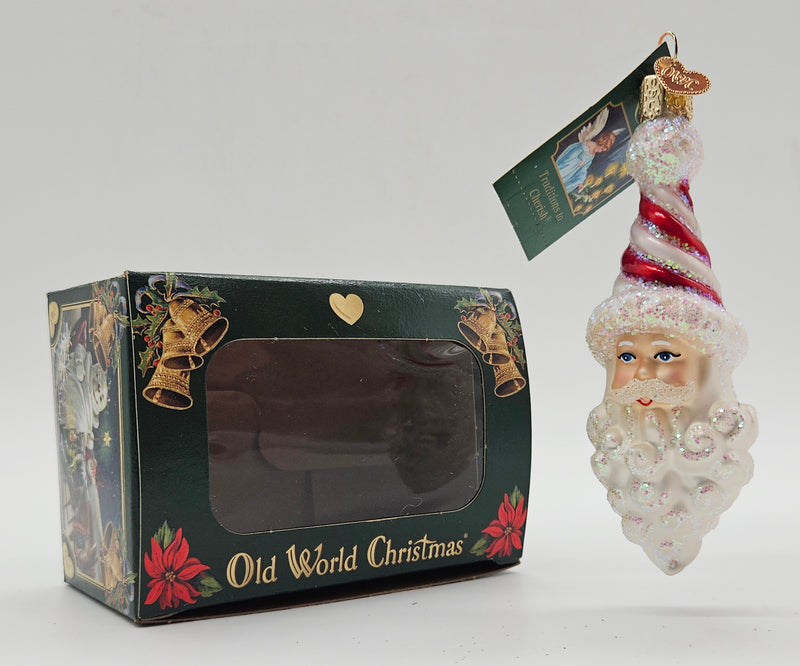 Old World Christmas Peppermint Twist Santa ornament #40269 – ornament alongside photographed packaging
