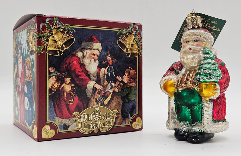 Old World Christmas Striped Father Christmas ornament #40014 – ornament alongside photographed packaging