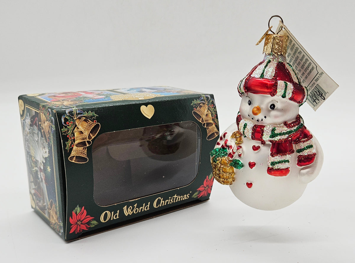 Old World Christmas Sweetie Pie ornament #24119 – ornament alongside photographed packaging