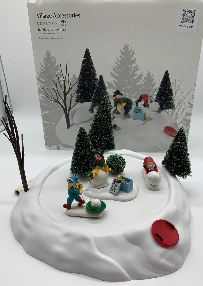 Dept 56- Building a Snowman