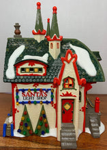 Load image into Gallery viewer, Dept 56 North Pole Village &quot;Santa’s Light Shop&quot;
