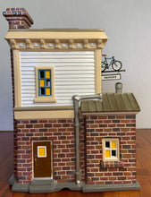 Load image into Gallery viewer, Department 56- Snow Village &quot;Wright Bike Shop&quot;  back
