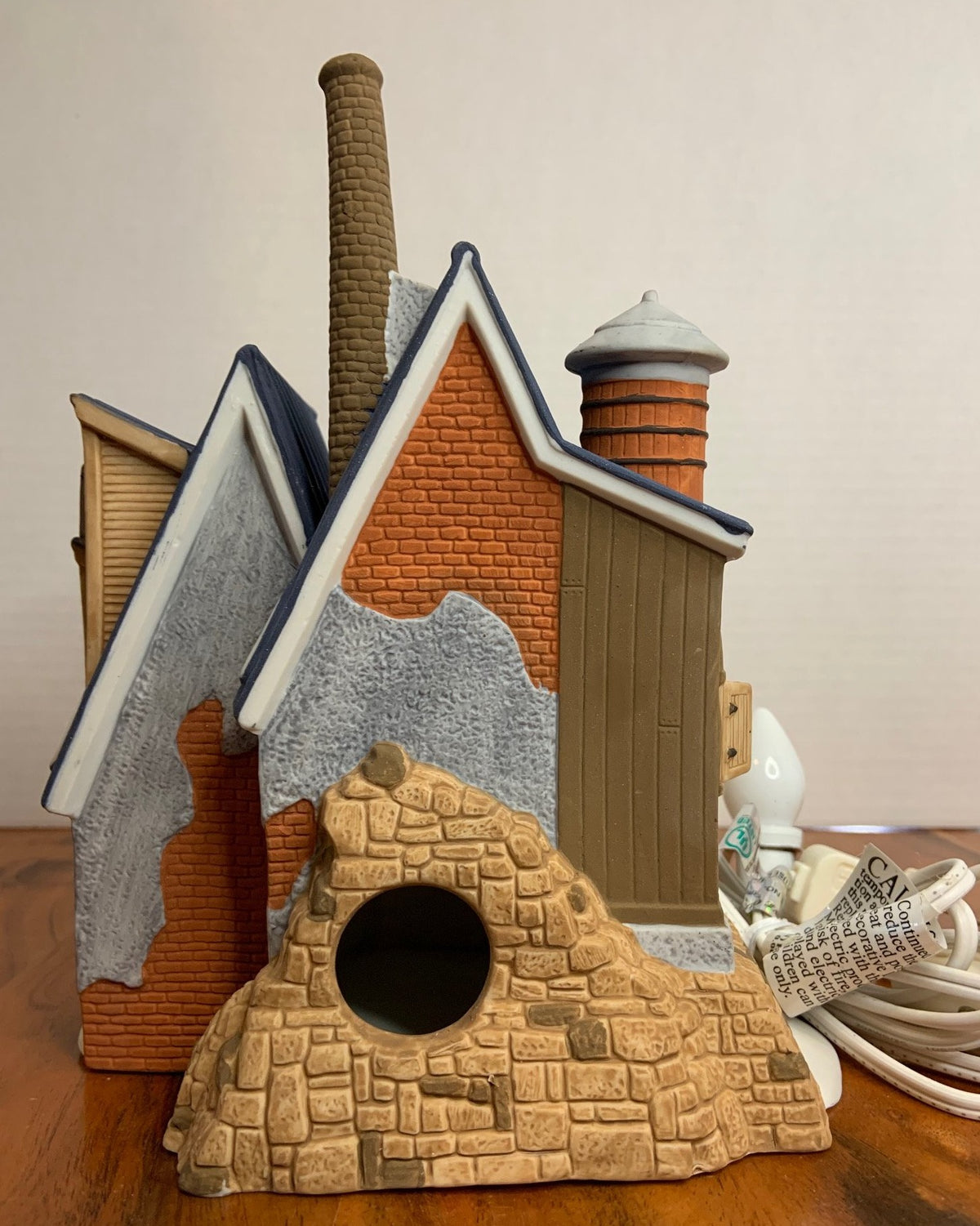 Retired Dept 56- New England Village "Yankee Jud Bell Casting" back
